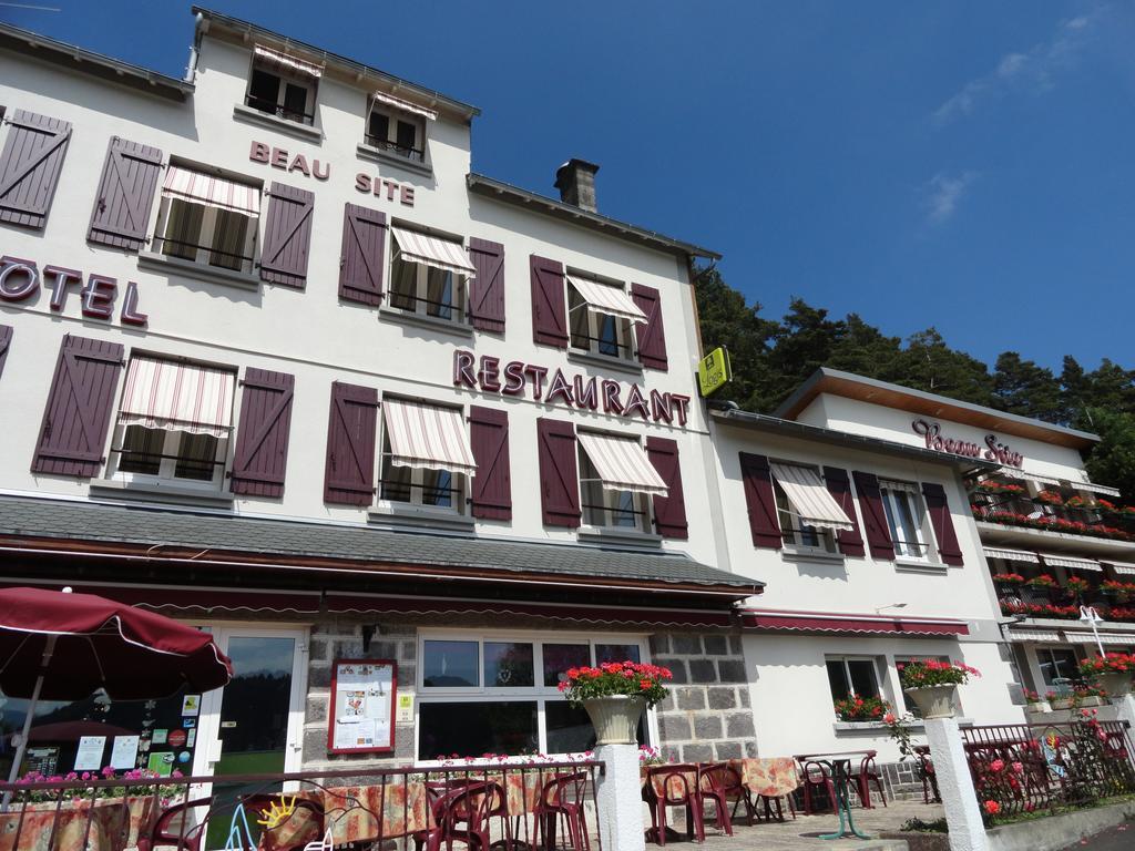 Logis Hotel Le Beau Site Шамбон-сюр-Лак Экстерьер фото