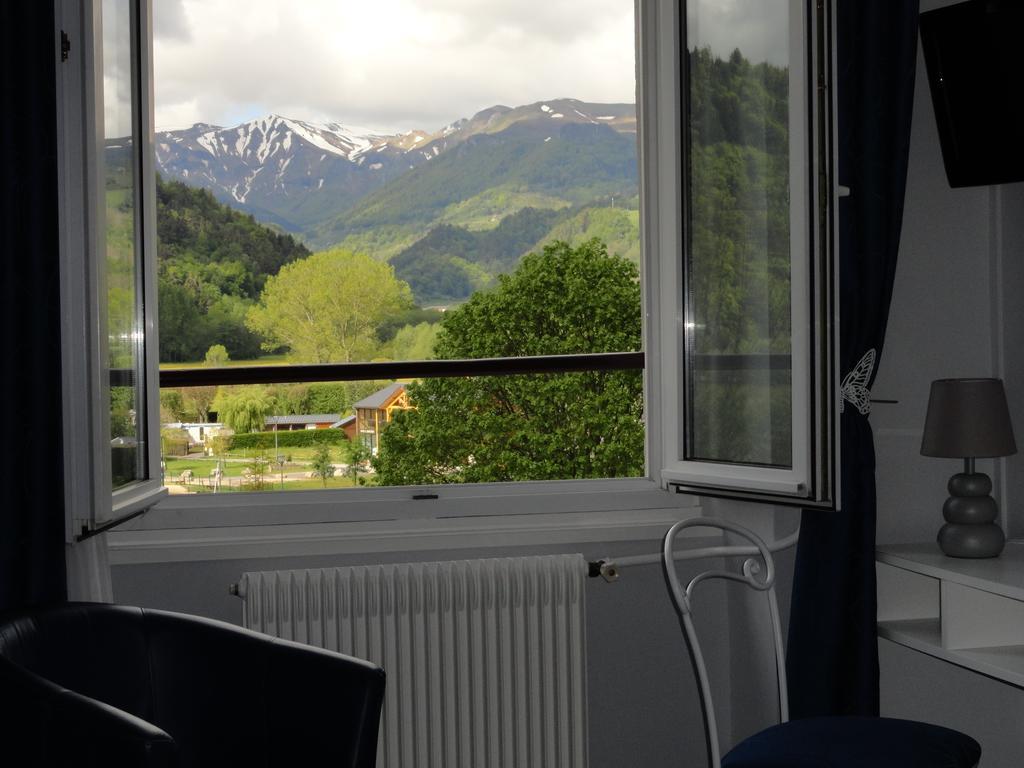 Logis Hotel Le Beau Site Шамбон-сюр-Лак Экстерьер фото